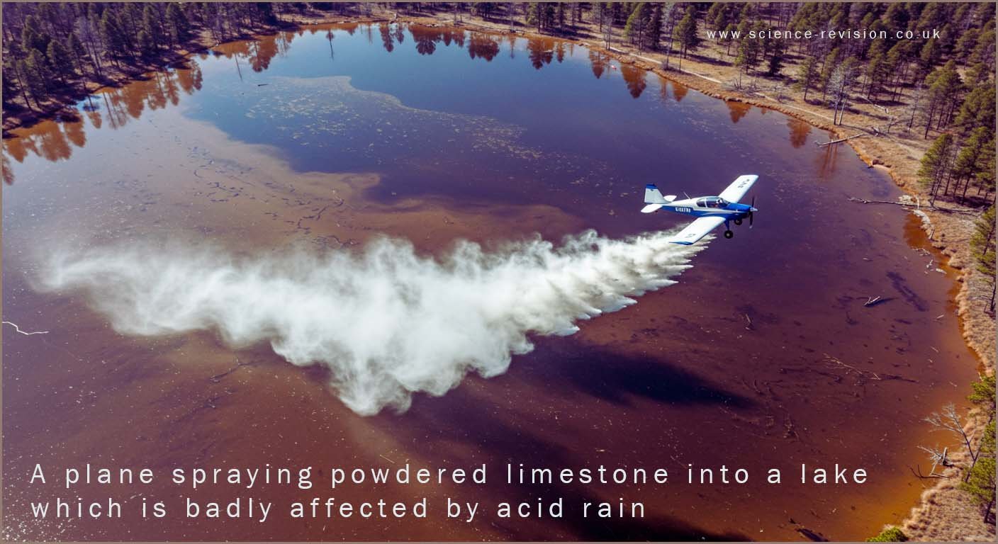 A plane spraying powdered limestone onto a lake to help deal with the problems caused by acid rain.